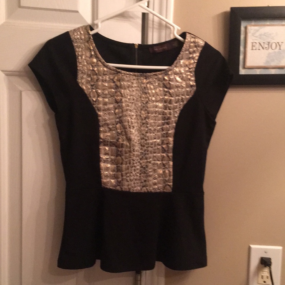The limited peplum blouse